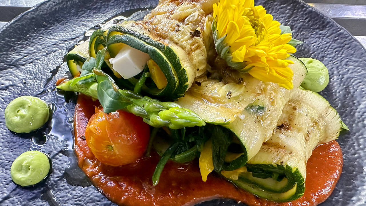 Zucchini Roll stuffed with tofu and roasted peppers and spinach 